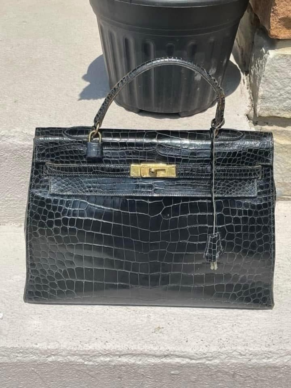 Hermes Kelly 35cm black crocodile bag. stamp is O from 1959
